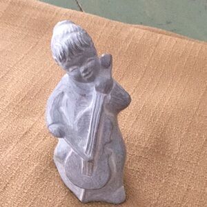 Isabel Bloom Cement Angel playing Cello 2003